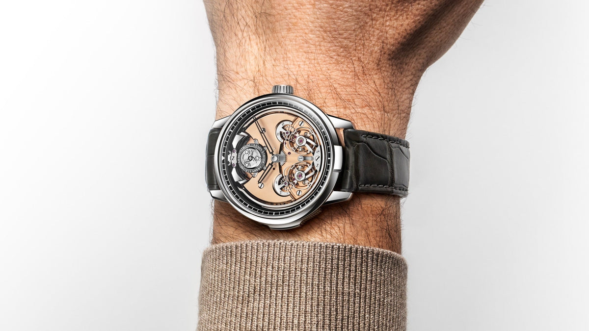 Armin Strom Minute Repeater Resonance 12:59 First Edition worn on the wrist under a beige knit sleeve