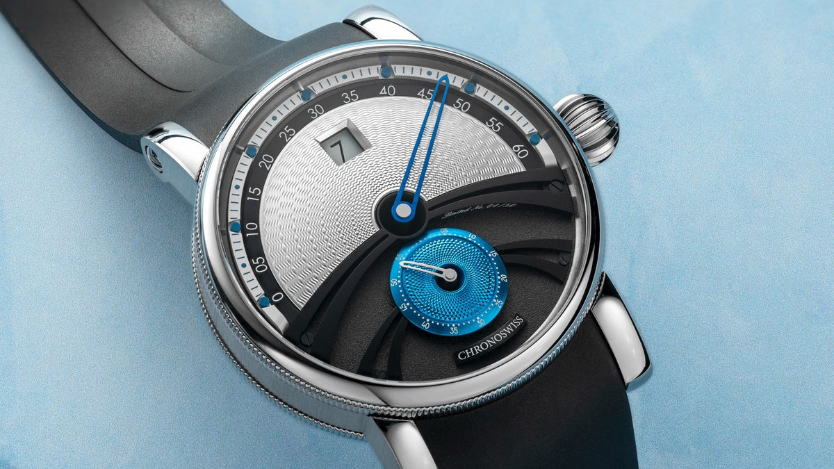Chronoswiss Delphis Glacier resting on an ice-blue textured surface