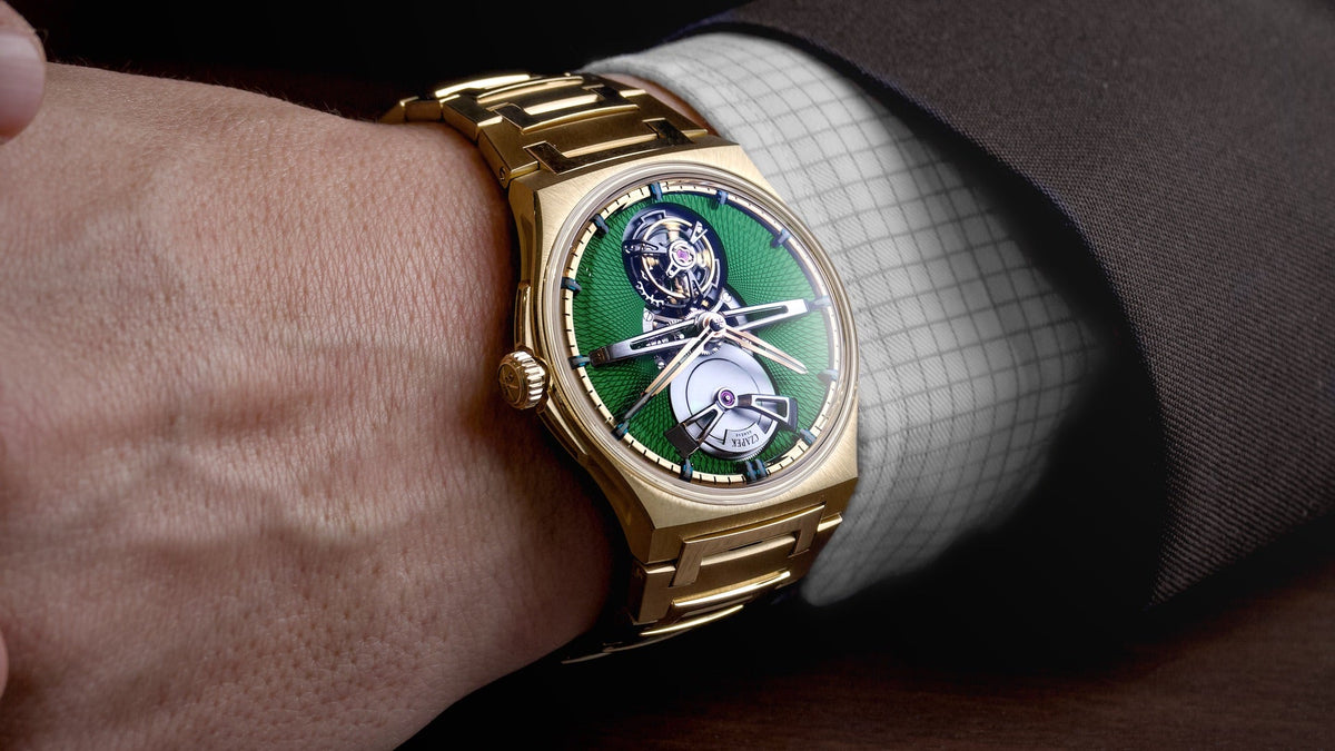 Czapek Antarctique Tourbillon Victory Green on the wrist, white cuff and dark suit