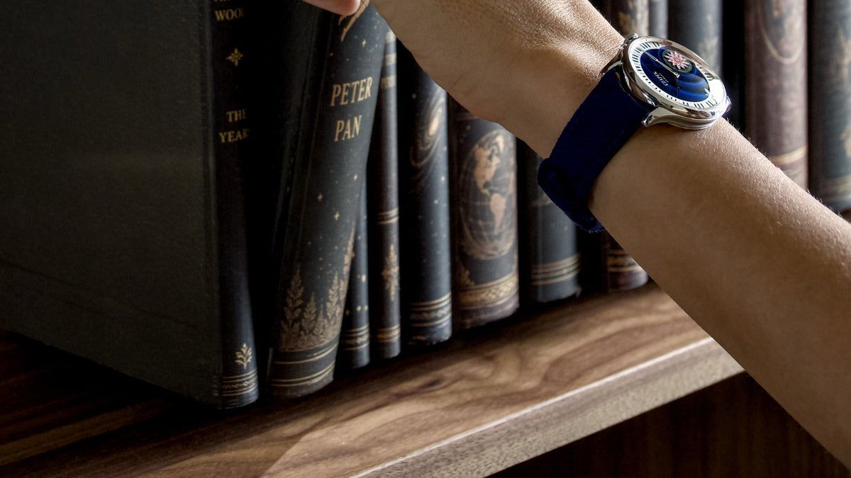 Czapek Promenade L’Écume des Jours with blue enamel dial, piano-key ring and water lily seconds hand, dark blue strap