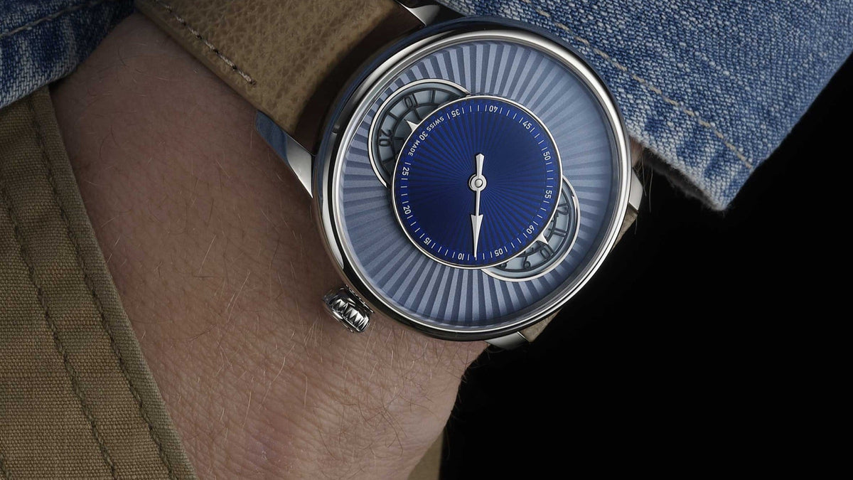 Louis Erard Le Régulateur Esprit Flinqué Blue worn on the wrist, denim sleeve