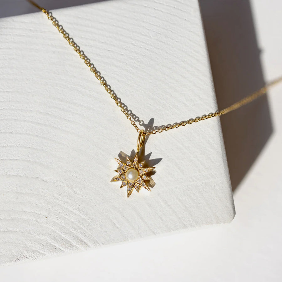 Tiny Om North Star necklace