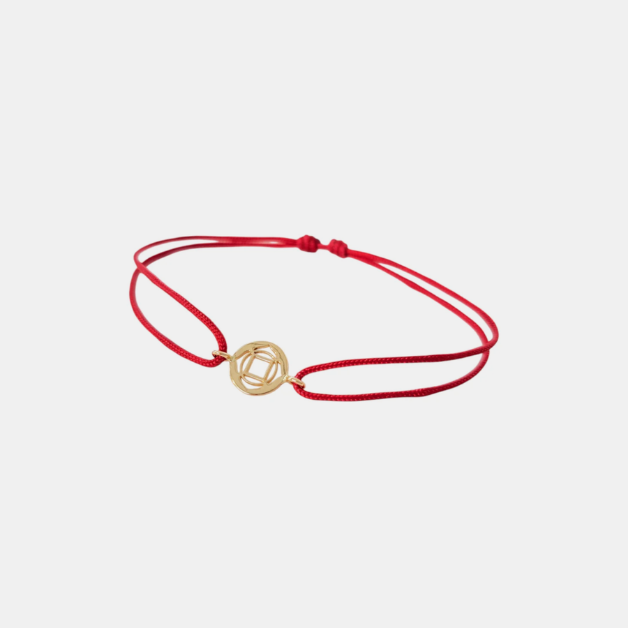 Tiny Om Roots disc bracelet on thread