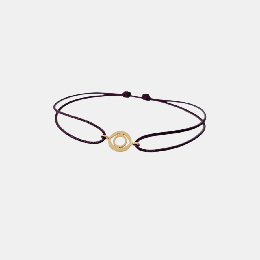 Tiny Om Serenity disc bracelet on thread